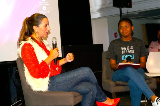 My student, Genevieve, interviews Rachel Lloyd, founder and director of GEMS, about her memoir Girls Like Us at our 2011 annual  GEMS assembly (photo courtesy, Laura Hahn).